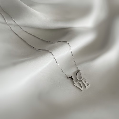 Svedena ogrlica od belog zlata sa cirkonima